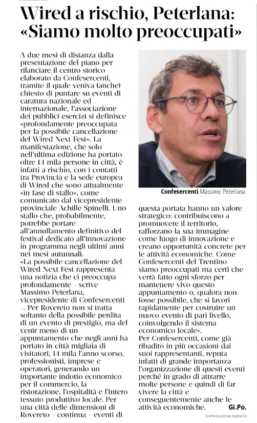 Limmagine mostra un articolo di giornale con il titolo Wired a rischio, Peterlana: Siamo molto preoccupati e una fotografia di un uomo identificato come Confesercenti Massimo Peterlana.